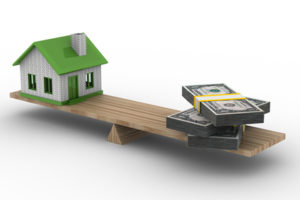 house and money on scales. Isolated 3D image